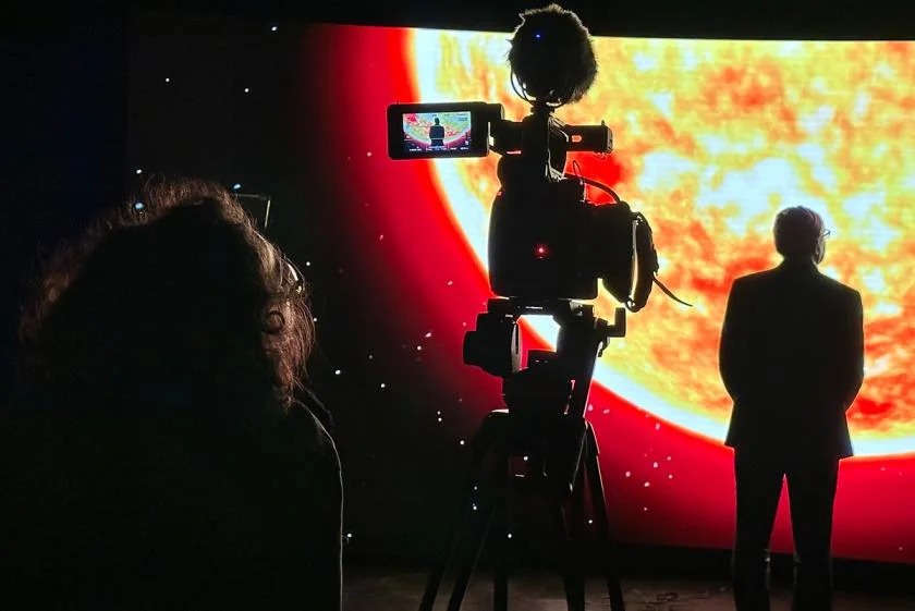 Camera shooting scene on set of CTVA's JPL documentary set.