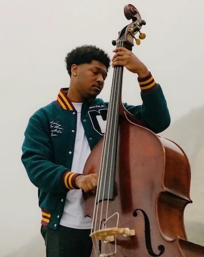 Jermaine Paul playing a Cello