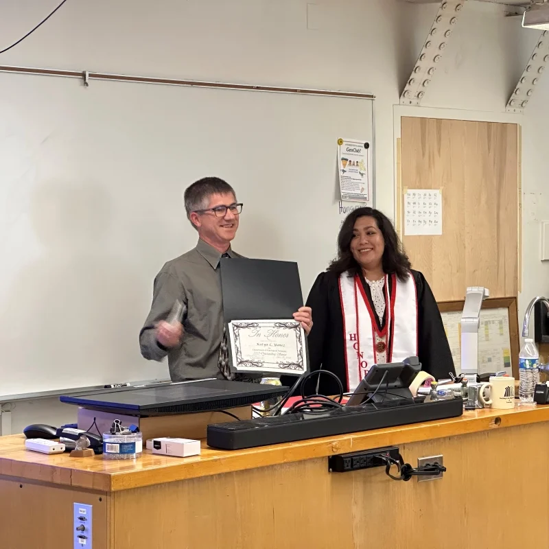 Geological Science student Katya Yanez receiving the award for Outstanding Undergraduate Student