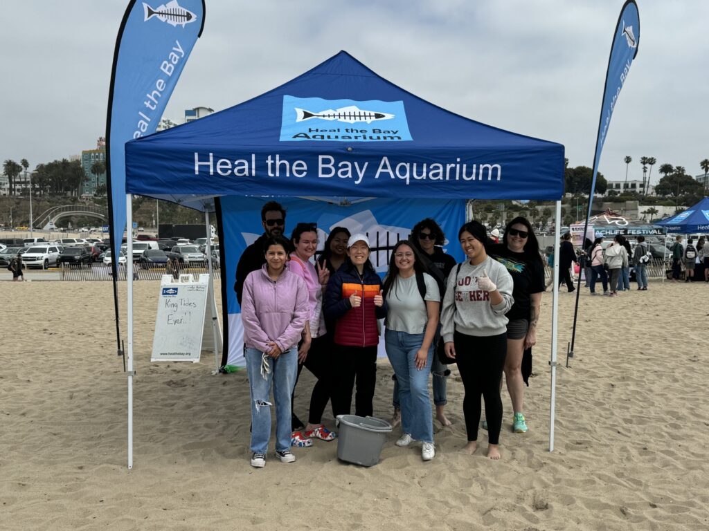 CSUN RSSA students proudly pose for a picture after volunteering to clean Santa Monica beach with Heal the Bay.