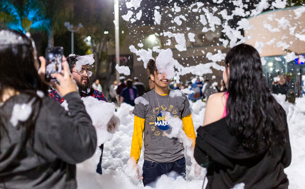 Students in a foam pit at USU Night Market