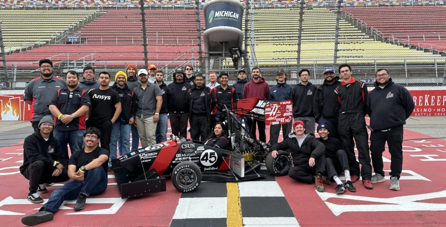 The CSUN Formula FSAE team at the Michigan International Speedway. (Photo courtesy of Matador Motorsports).