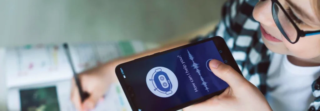 Close-up of a woman with her hand on a cell phone, using AI.
