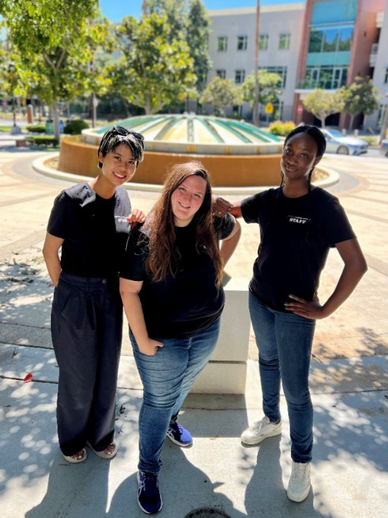 Group of three students standing outside on the CSUN Campus.