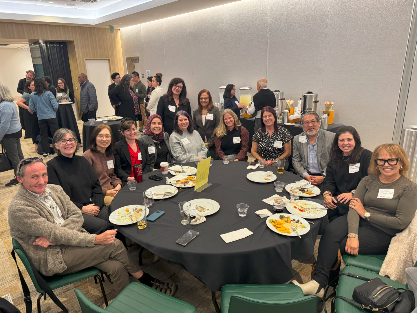 College of Education principal investigators gathered around a table