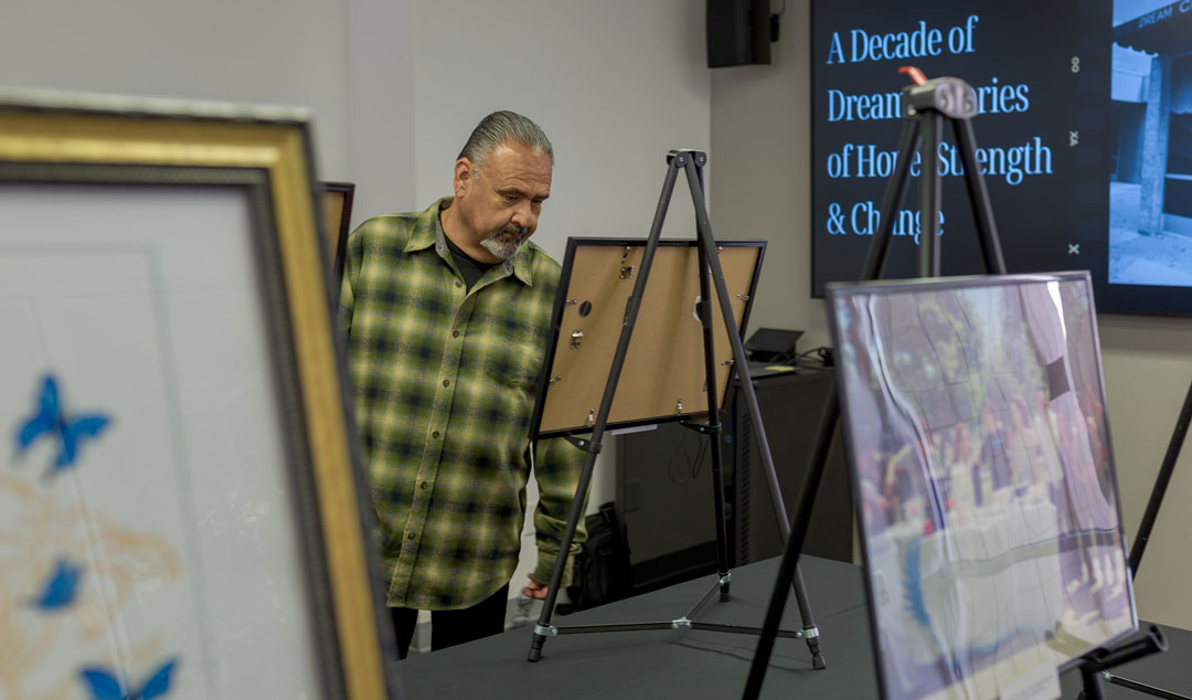 The Nurturing Roots, Cultivating Futures: A Decade of Dreams event featured a gallery of photographs from the DREAM Center’s past.
