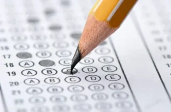 Closeup of pencil filling in circle on exam.