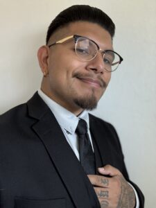 Professional headshot of a business professional. 