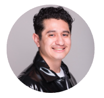 Professional headshot of a man in a suit