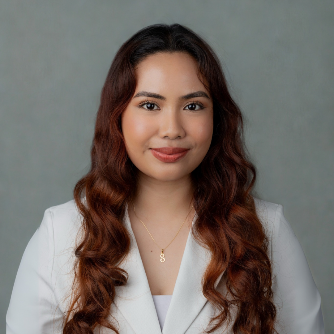Samantha Beltran looking into camera and smiling for a headshot photo