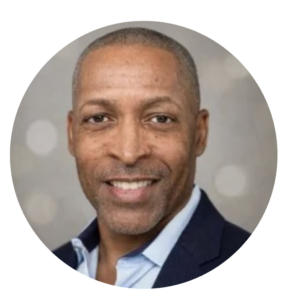 Professional headshot of a business man.